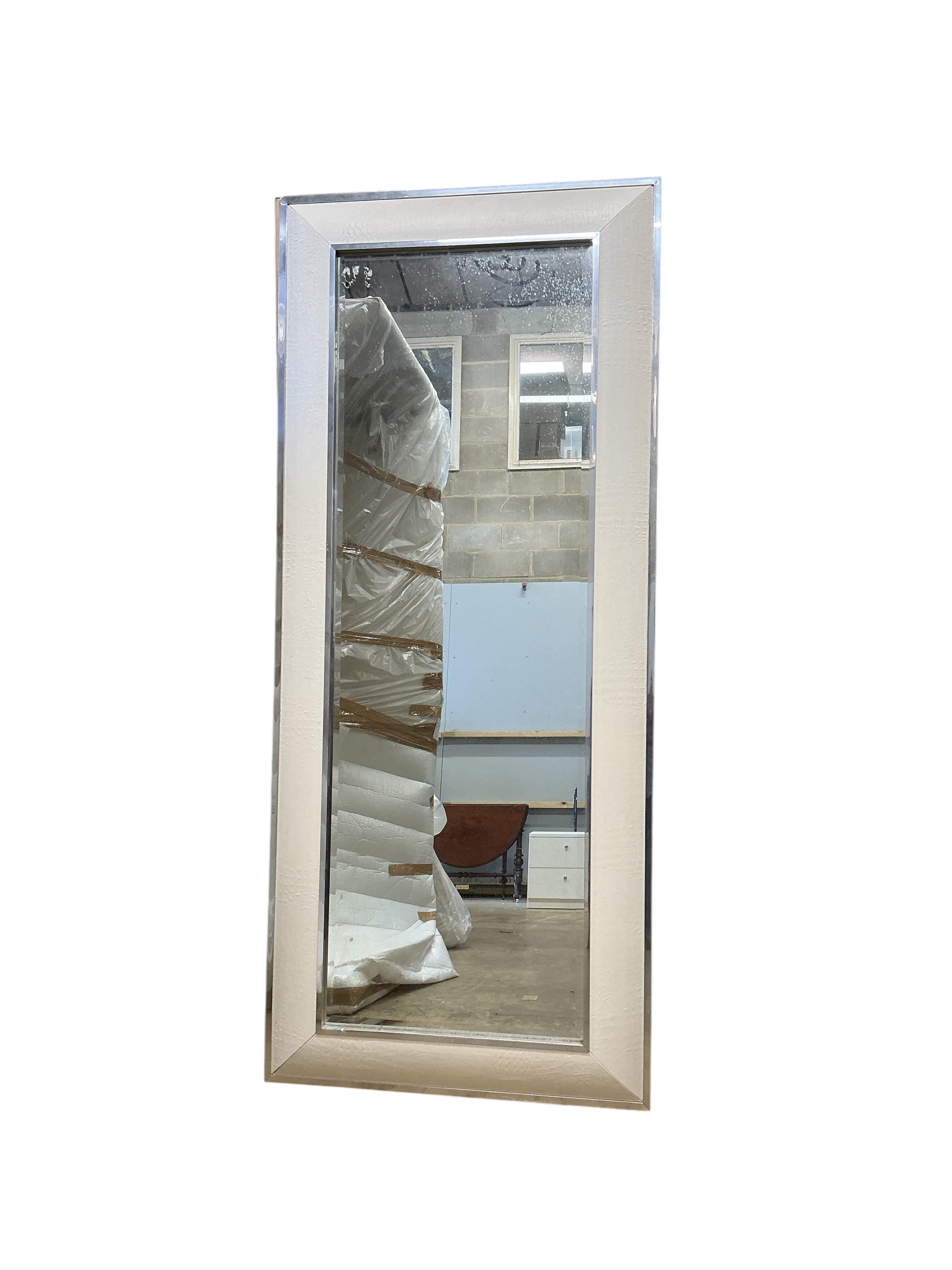 A pair of large rectangular chrome and faux crocodile wall mirrors, 228cm x 96cm